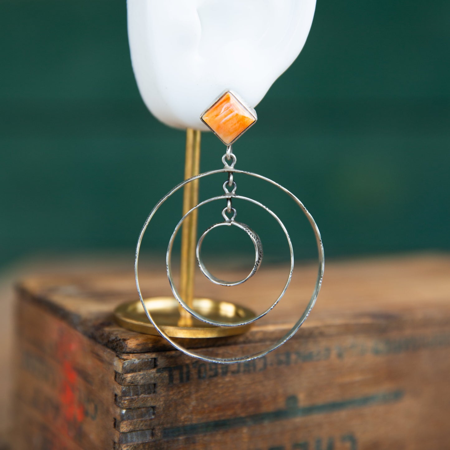 The Canova's | Stamped Orange Spiny Hoops by Leroy James