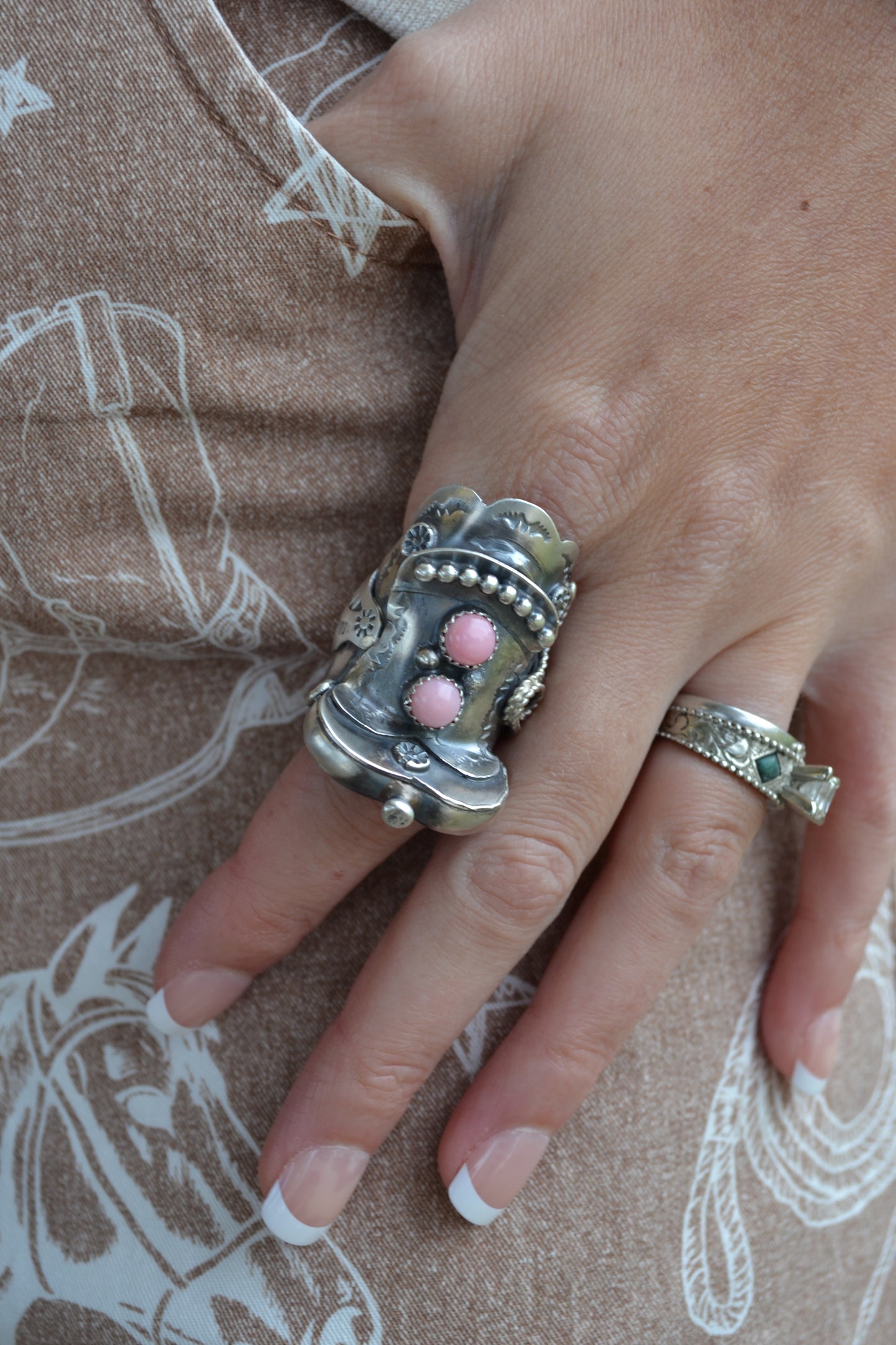 Tim Yazzie pink conch saddle ring
