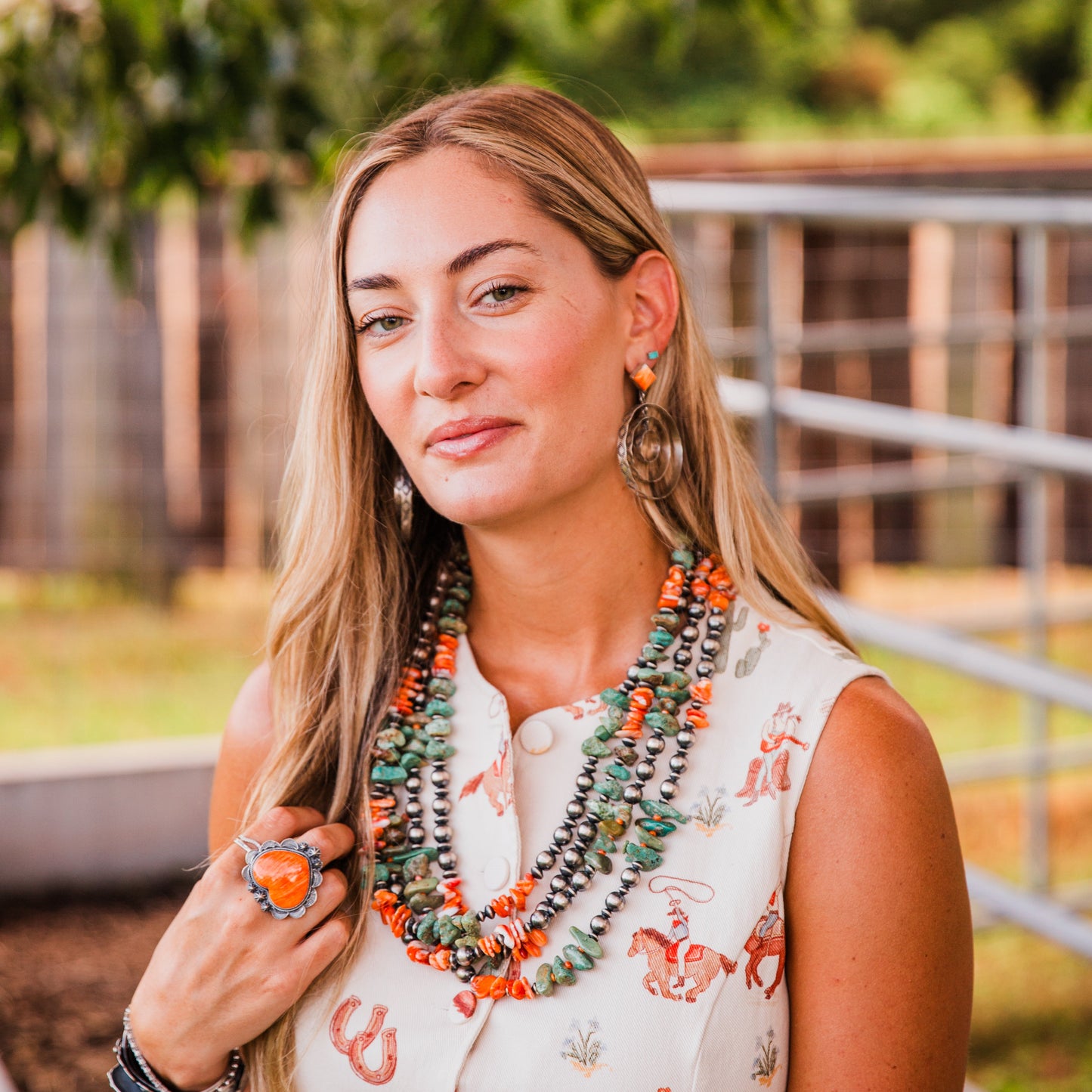 The Canova's | Stamped Orange Spiny Hoops by Leroy James