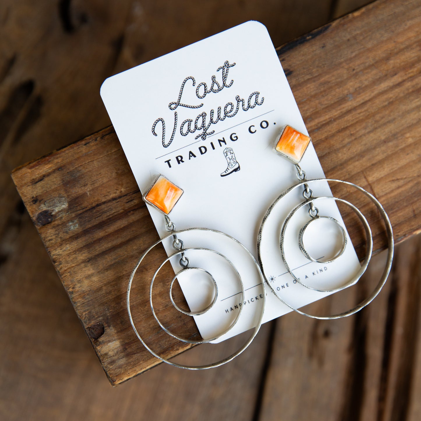 The Canova's | Stamped Orange Spiny Hoops by Leroy James