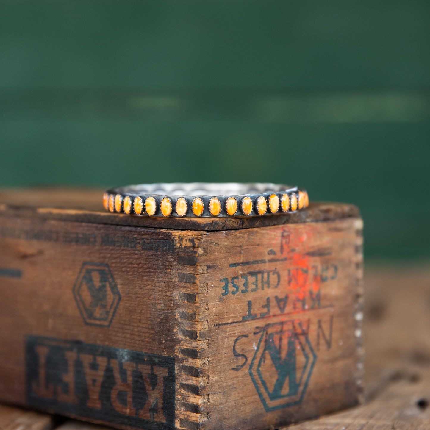 The Phoenix | Orange Spiny Bangles by Charles Johnson
