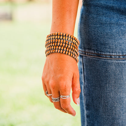 The Phoenix | Orange Spiny Bangles by Charles Johnson