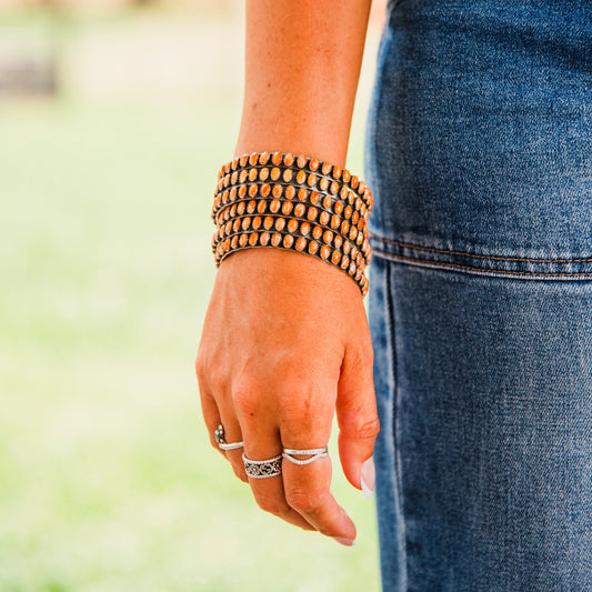 The Phoenix | Orange Spiny Bangles by Charles Johnson
