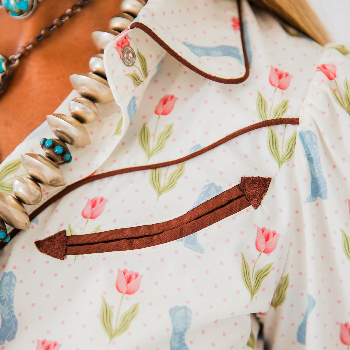 The Roselyn | Cowgirl boot and Floral Pearl Snap Long Sleeve Top