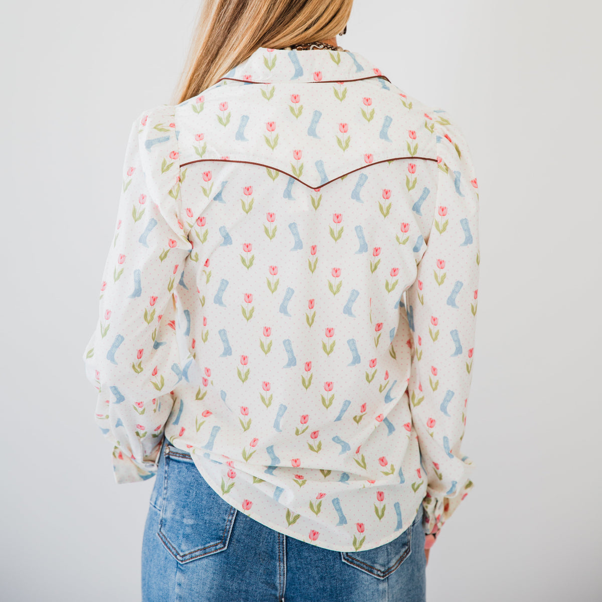 The Roselyn | Cowgirl boot and Floral Pearl Snap Long Sleeve Top
