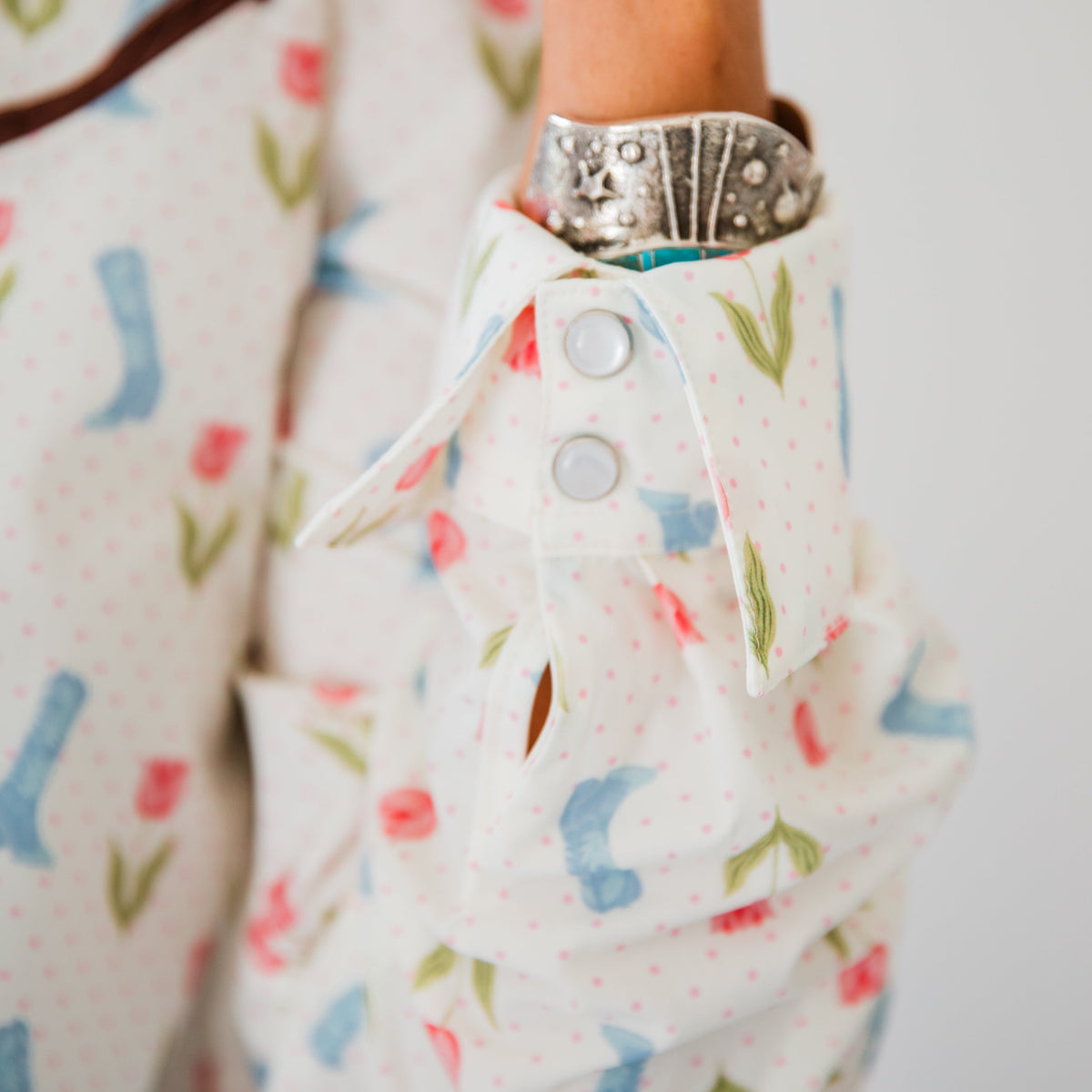 The Roselyn | Cowgirl boot and Floral Pearl Snap Long Sleeve Top