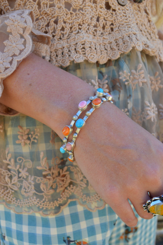 orange spiny pink conch and turquoise bangle bracelet