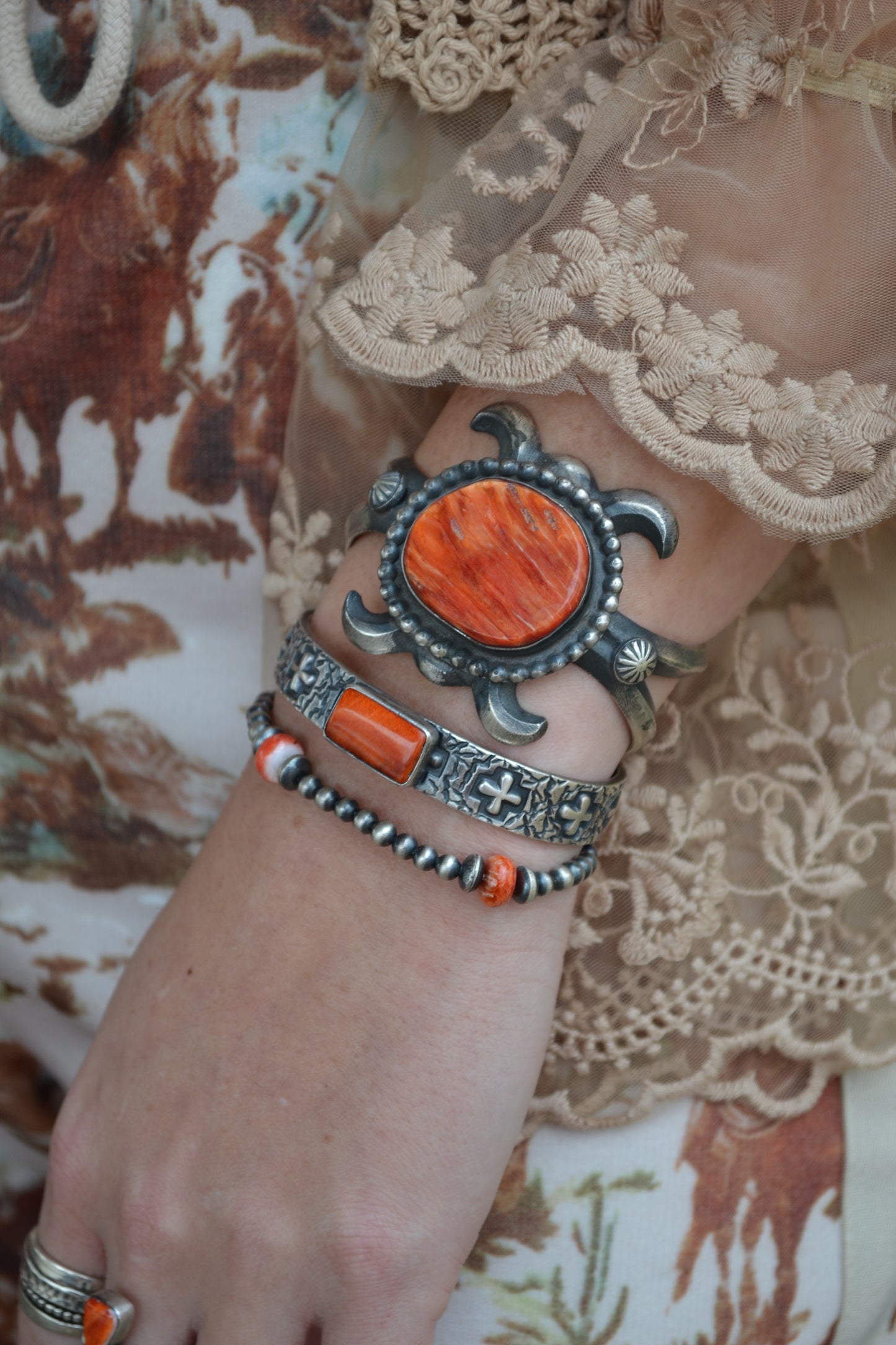The Eagan | Orange Spiny Cross Cuff by Raymond Coriz