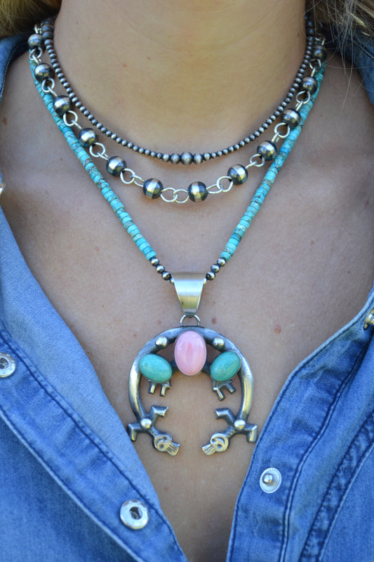 chimney butte pink conch and turquoise naja pendant
